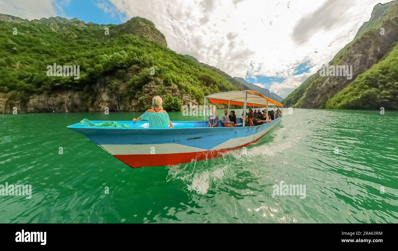 Shala River, Albania - June 16, 2023: people on boat tour in Shala