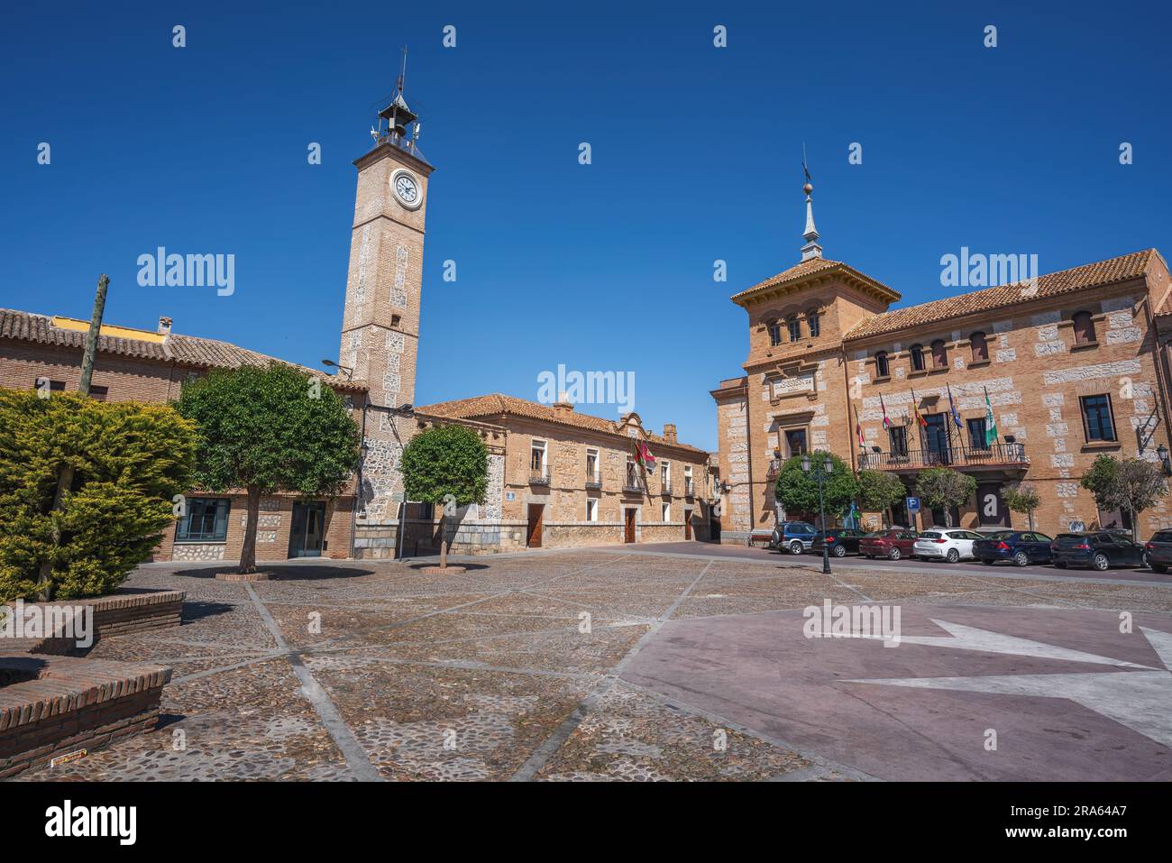 Plaza de Espana Square with Clock Tower (Torre del Reloj) and Consuegra City Hall - Consuegra, Castilla-La Mancha, Spain Stock Photo