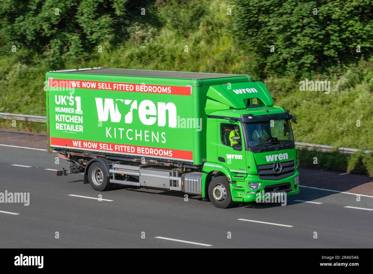 Wren Kitchens Haulage delivery trucks, green lorry, transportation