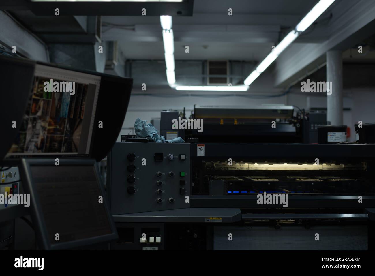 Printing house printing process interior machines paper Stock Photo - Alamy