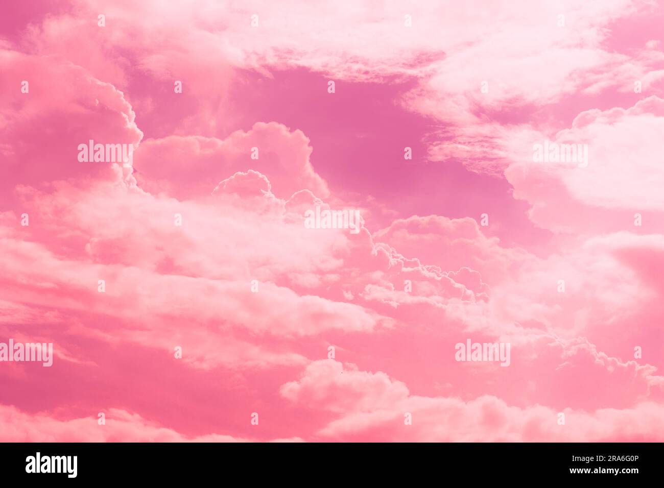 Pink sky cloud. Heaven place of sweet love pink red color tone for wedding card background. Stock Photo