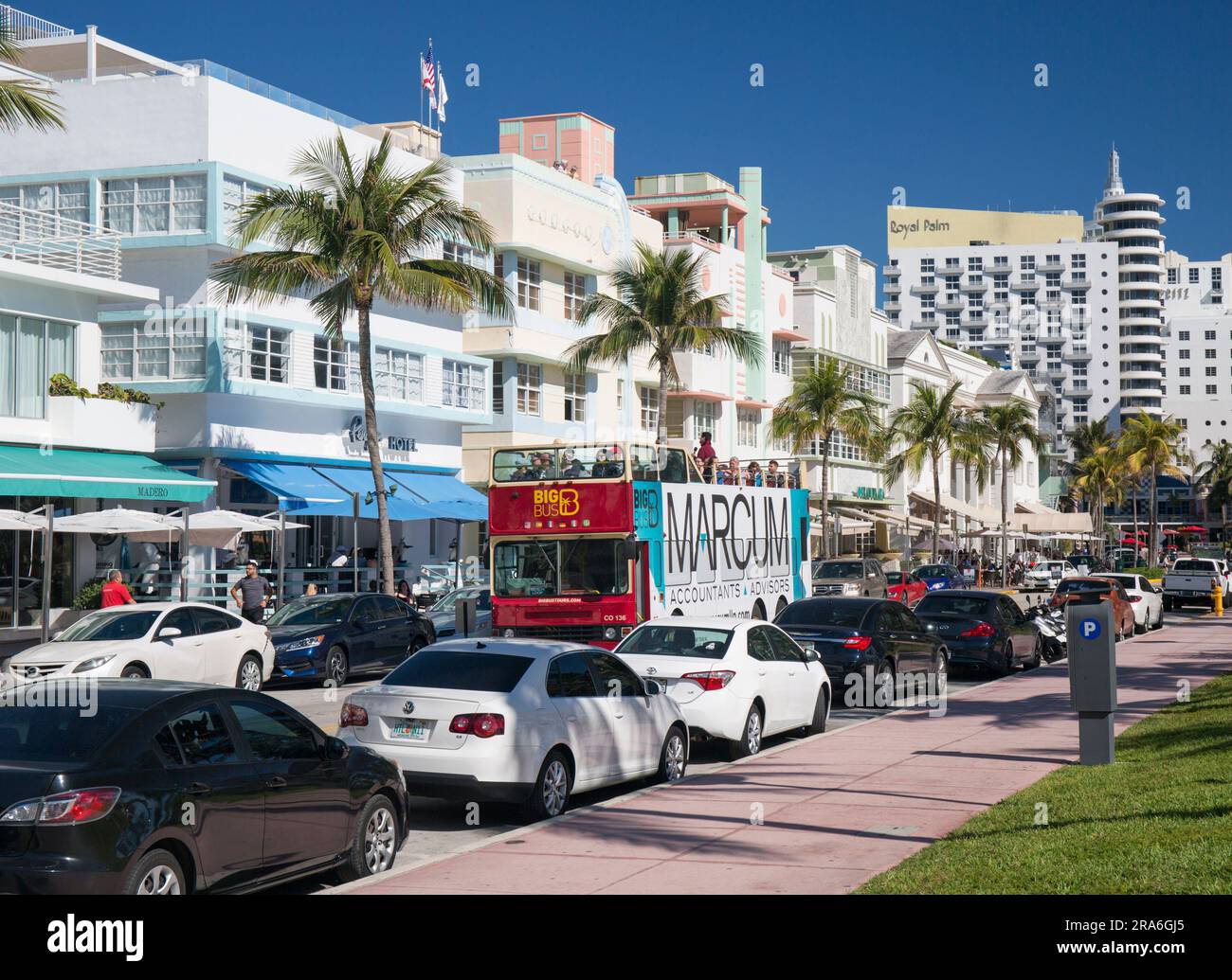 Miami Beach, Florida, USA. Open top tour bus making its way along Ocean Drive, Miami Beach Architectural District, South Beach. Stock Photo