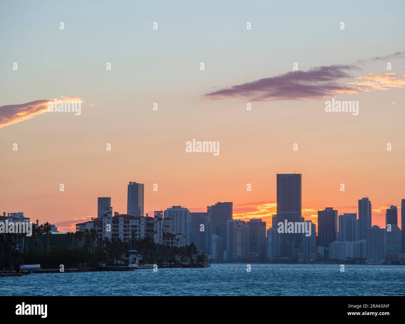 Miami Beach, Florida, USA. View from South Pointe Park, South Beach, across Biscayne Bay to the skyscrapers of Downtown Miami, sunset. Stock Photo