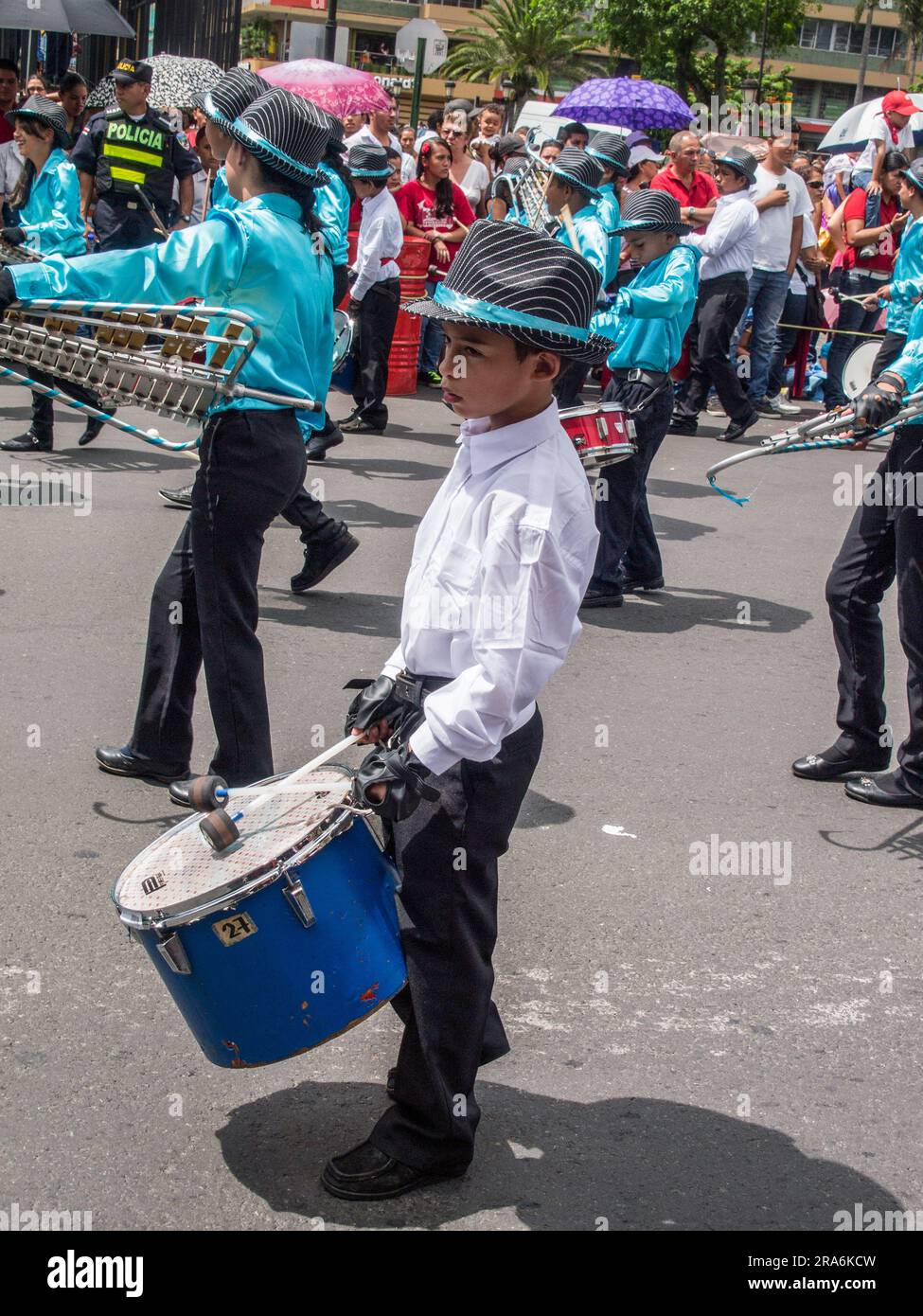 Young boy drumming in a Costa Rican Independence Day parade in San José