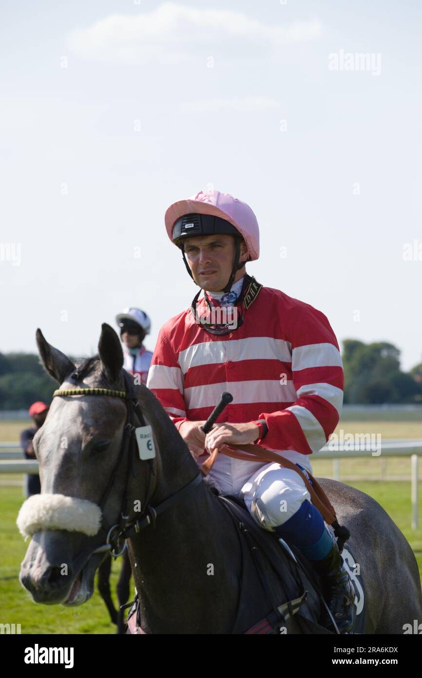 Jockey Connor Beasley on Mecca's Duchess at York Racecourse. Stock Photo