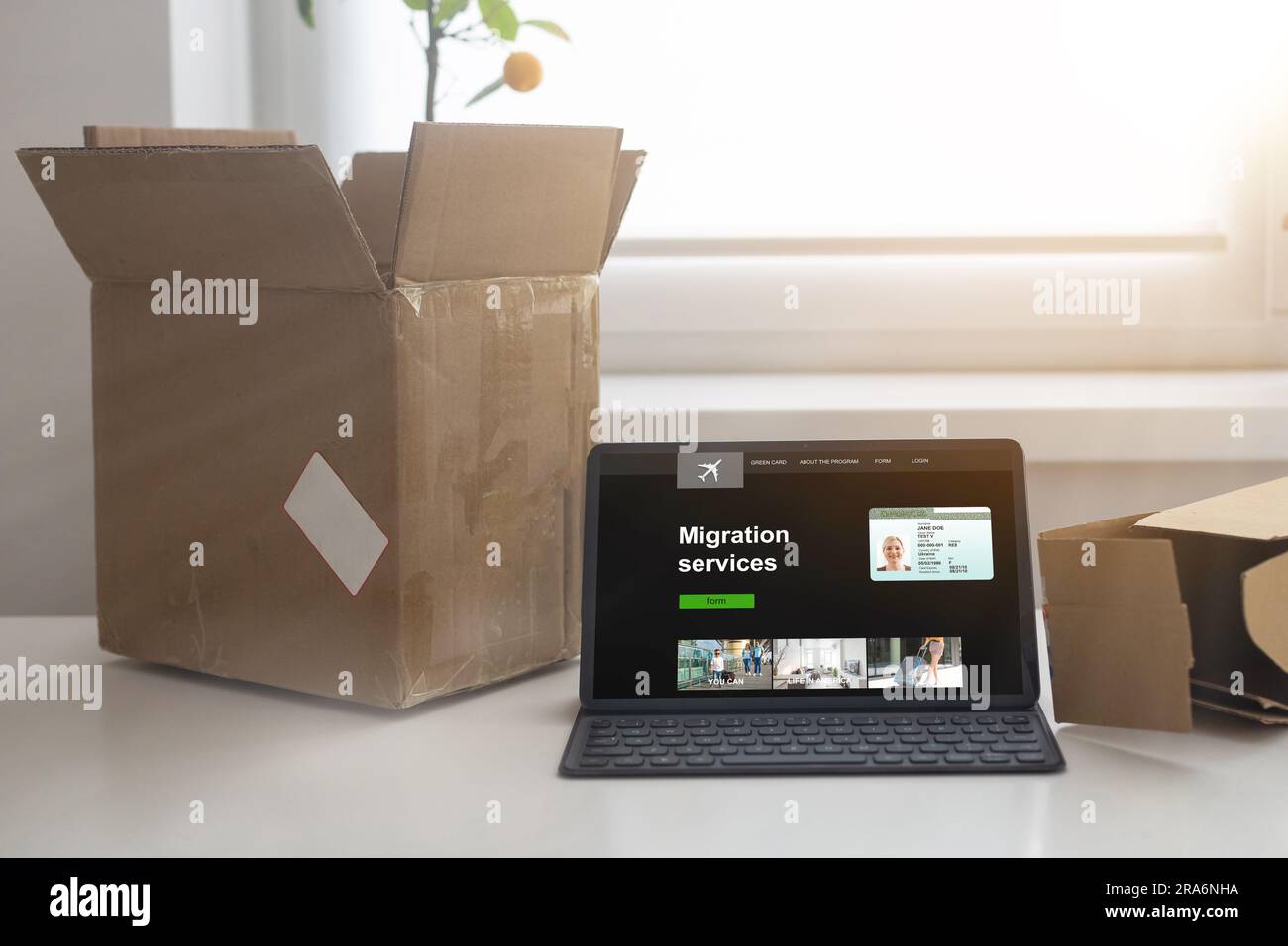 Woman fills out application to Consular Section of Embassy to obtain ...