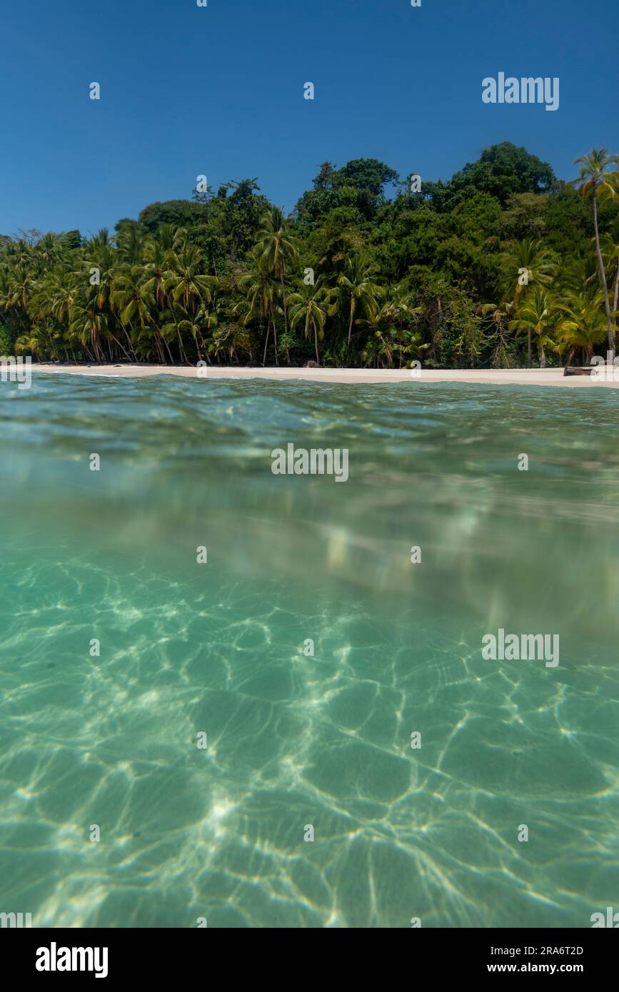 Tropical island beach beyond ocean surface, Coiba island, Pacific Ocean, panama - stock photo Stock Photo