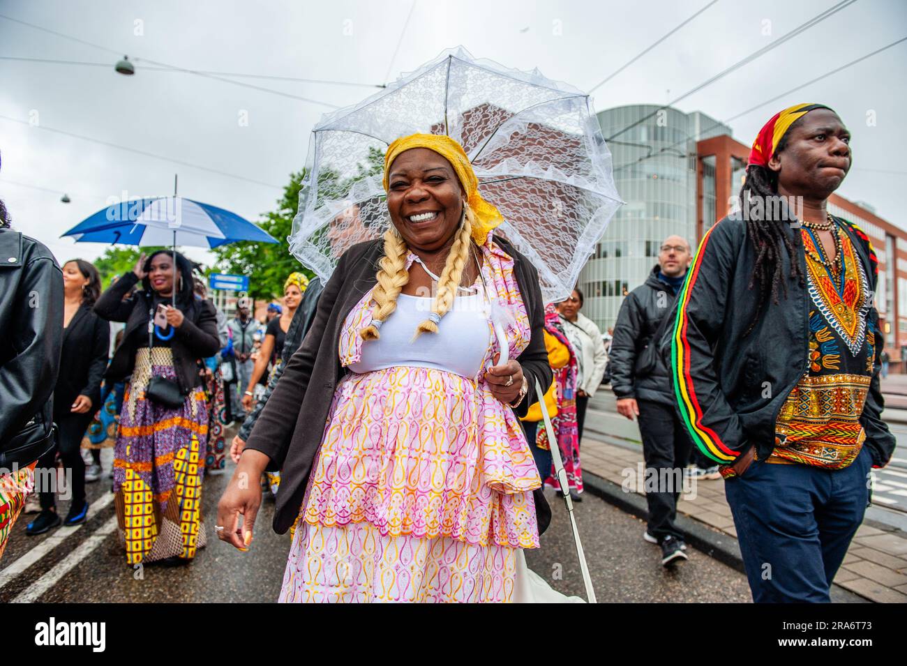 Amsterdam, Netherlands. 01st July, 2023. Suriname woman is seen happily
