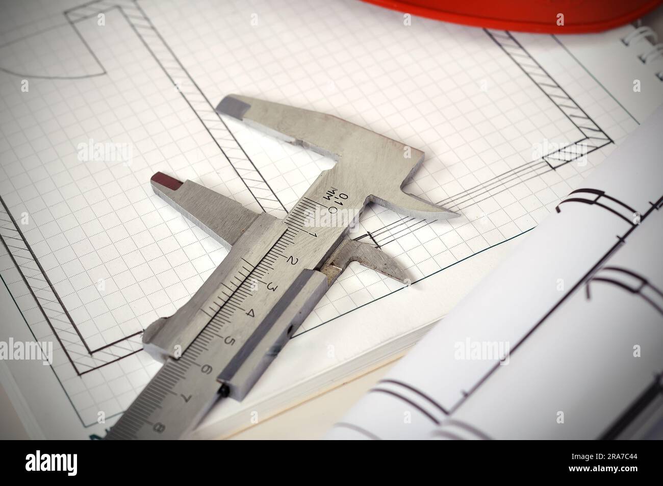 caliper and sketches blueprint  on the table Stock Photo