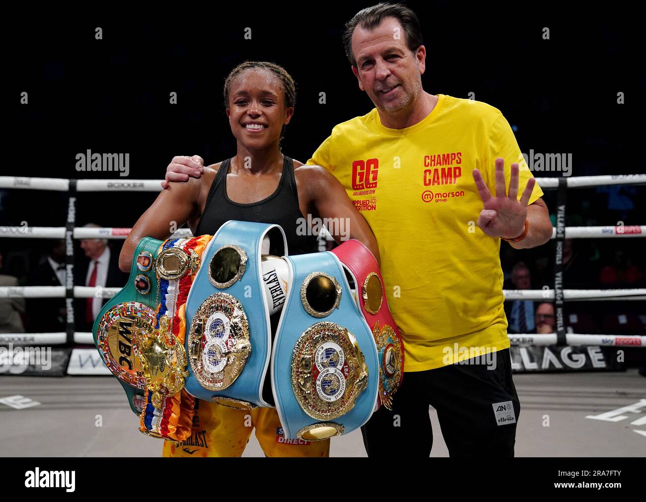 Natasha Jonas celebrates victory against Kandi Wyatt with trainer Joe Gallagher after their IBF International welterweight title bout at the AO Arena, Manchester. Picture date: Saturday July 1, 2023. Stock Photo