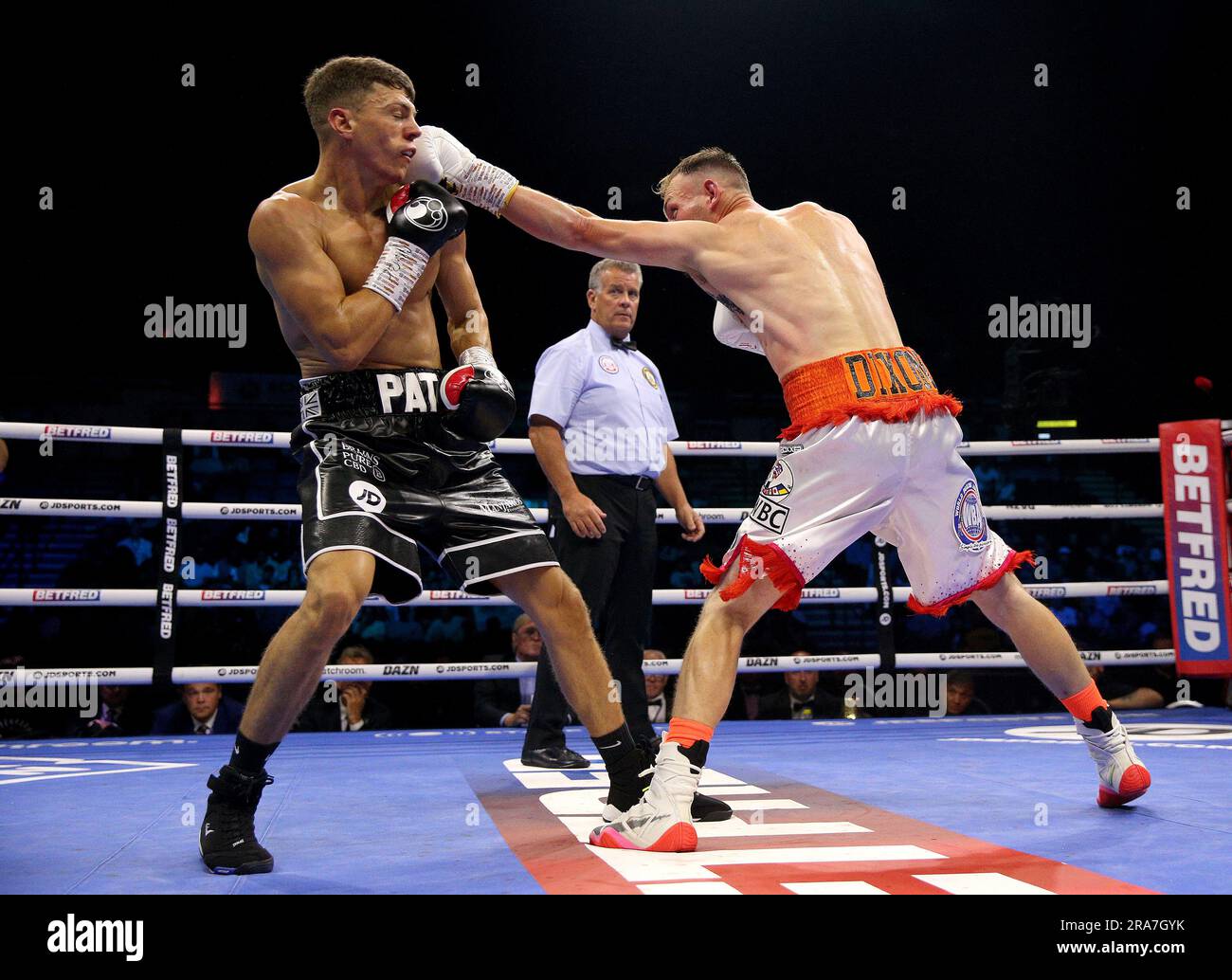 Pat McCormack (left) and Tony Dixon in action during their WBA Continental Super-Welterweight Title bout at the Utilita Arena Sheffield. Picture date: Saturday July 1, 2023. Stock Photo
