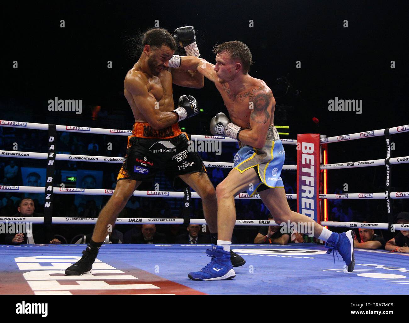 Sam Maxwell (left) is knocked out by Dalton Smith during their British