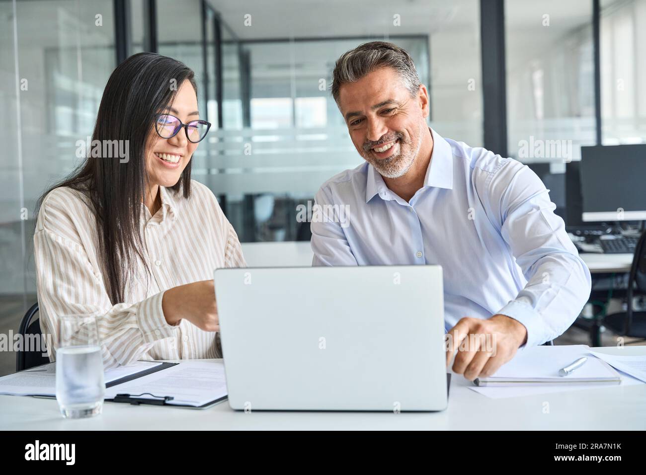 Diverse coworkers collaborating using hi-res stock photography and ...