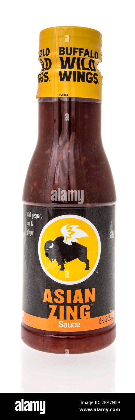 Winneconne, WI - 25 June 2023: A bottle of Buffalo wild wings sauce Asian zing on an isolated background. Stock Photo