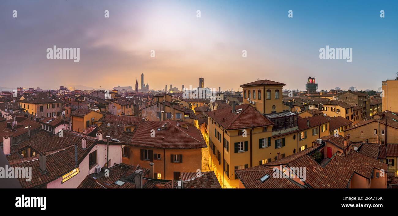 Bologna, Italy rooftop skyline and famous historic towers at dusk. Stock Photo