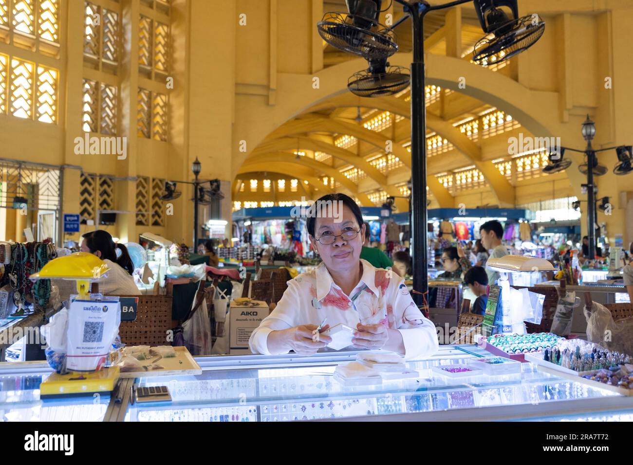 A merchant at her store in Phnom Penh