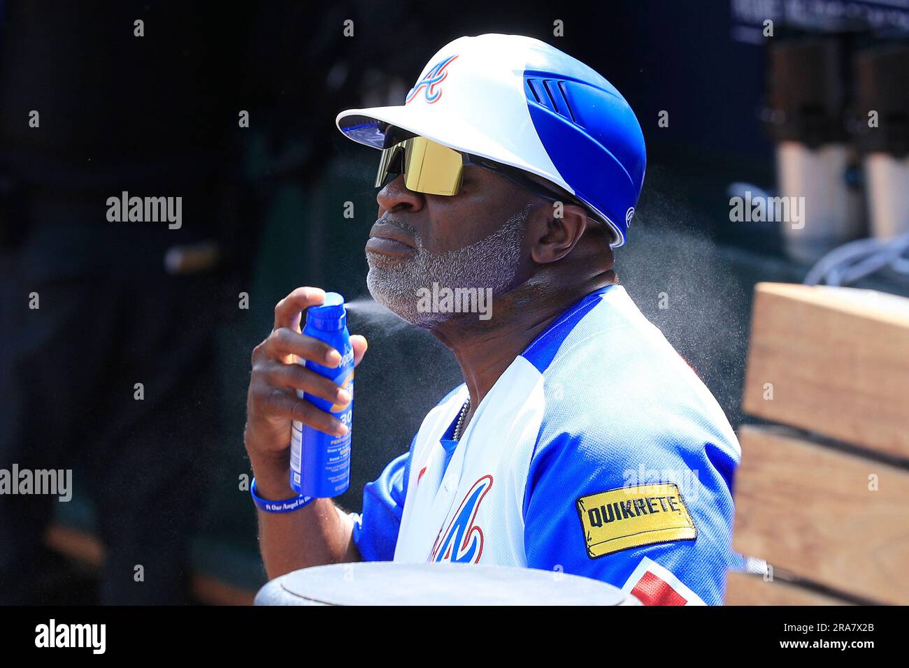 ATLANTA, GA JULY 01 Atlanta Braves first base coach Eric Young, Sr. (2) applies some sun