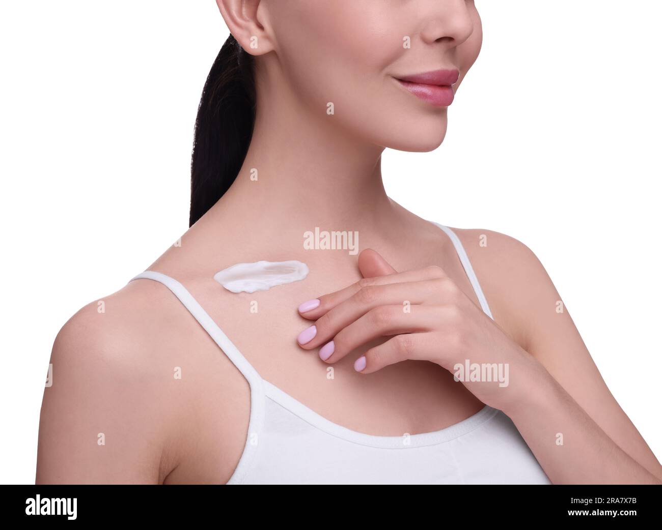 Woman with smear of body cream on her collarbone against white background, closeup Stock Photo