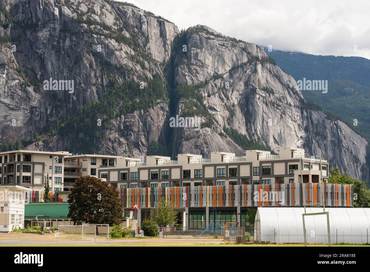 New condominium and housing development with the Stawamus Chief in the background. Squamish BC, Canada. Stock Photo