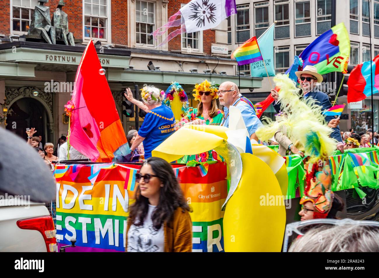Participants on the annual London Pride event riding on a float in the