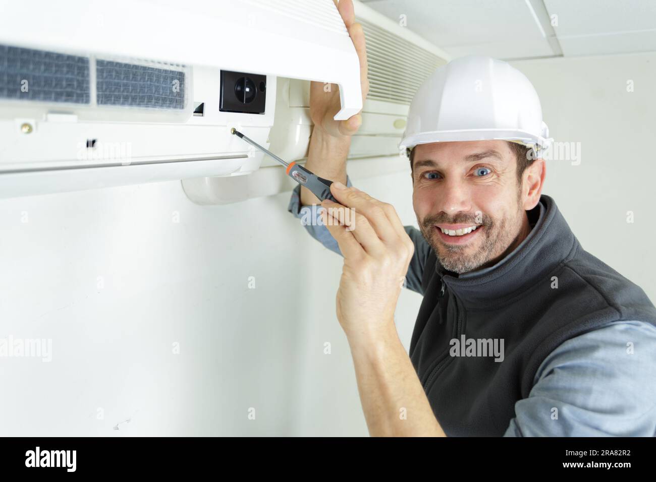 air conditioning technician at work Stock Photo Alamy