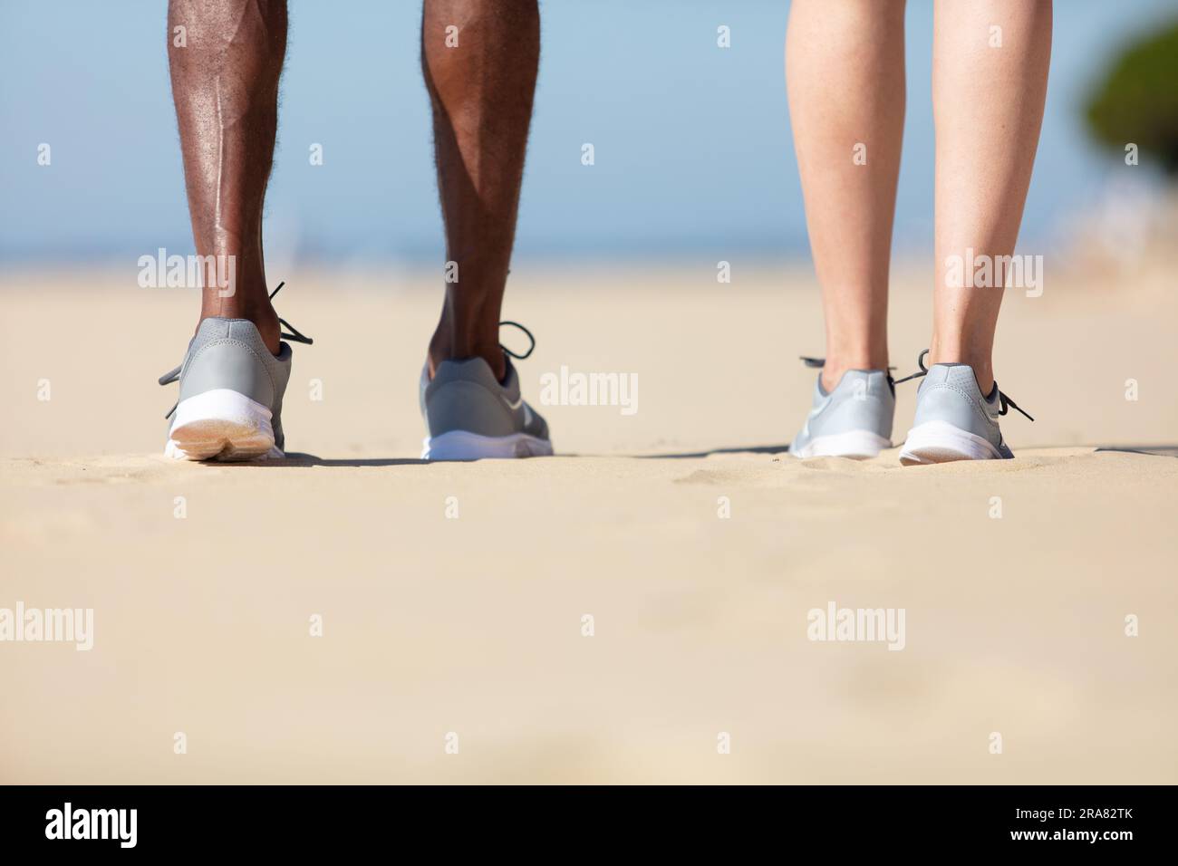 Male feet walking on sand hi-res stock photography and images - Alamy