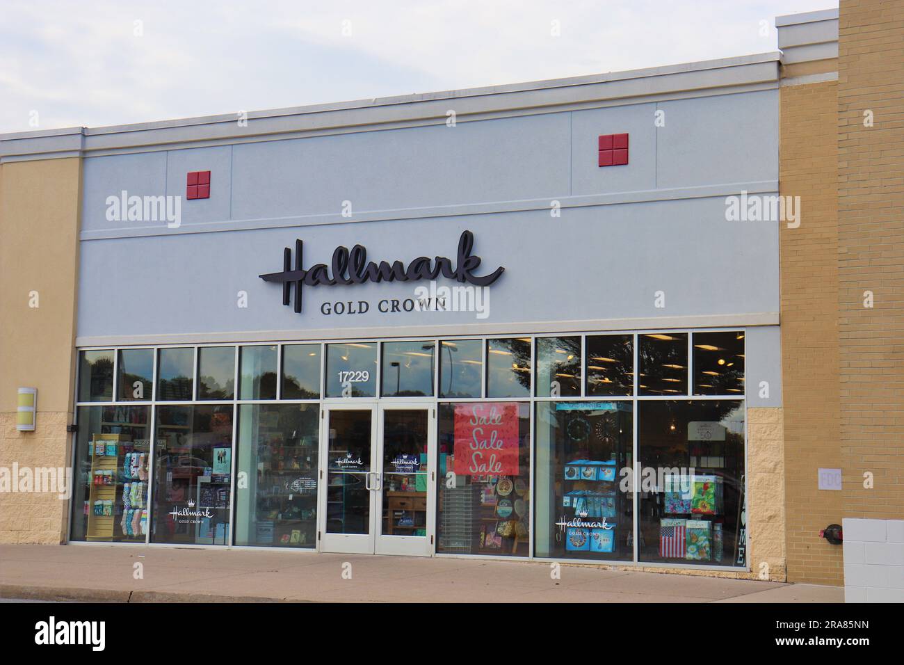 Hallmark gold crown store front door logo Stock Photo Alamy