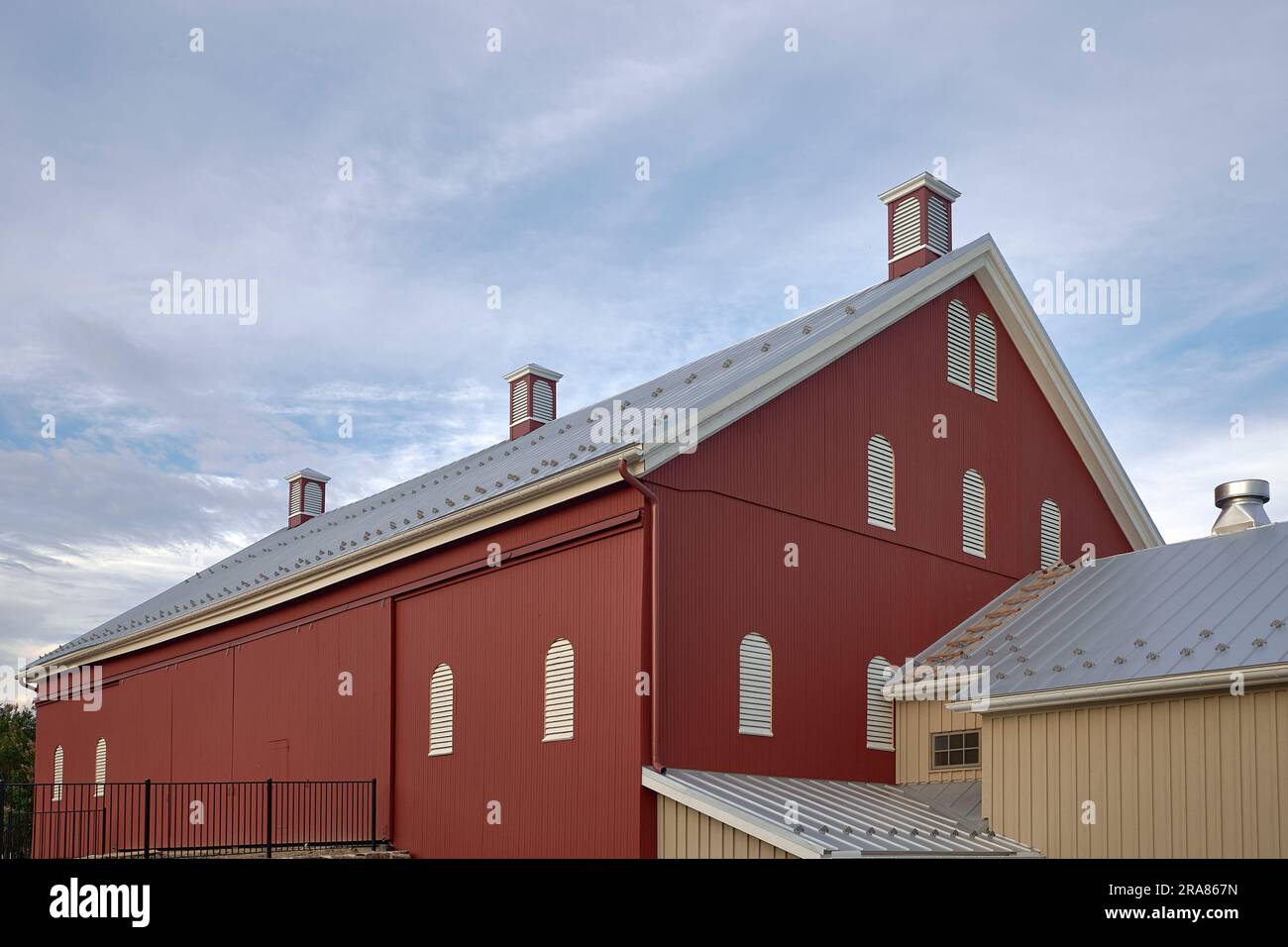 Large traditional red barn, newly renovated, at the Claggett Center in Adamstown, Maryland USA. Stock Photo