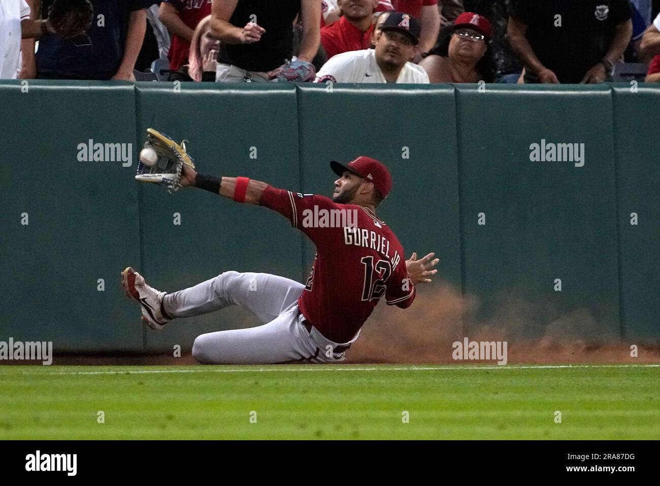 Colorado Rockies first baseman Mike Moustakas (11) in the sixth inning of a  baseball game Wednesday, April 12, 2023, in Denver. (AP Photo/David  Zalubowski Stock Photo - Alamy