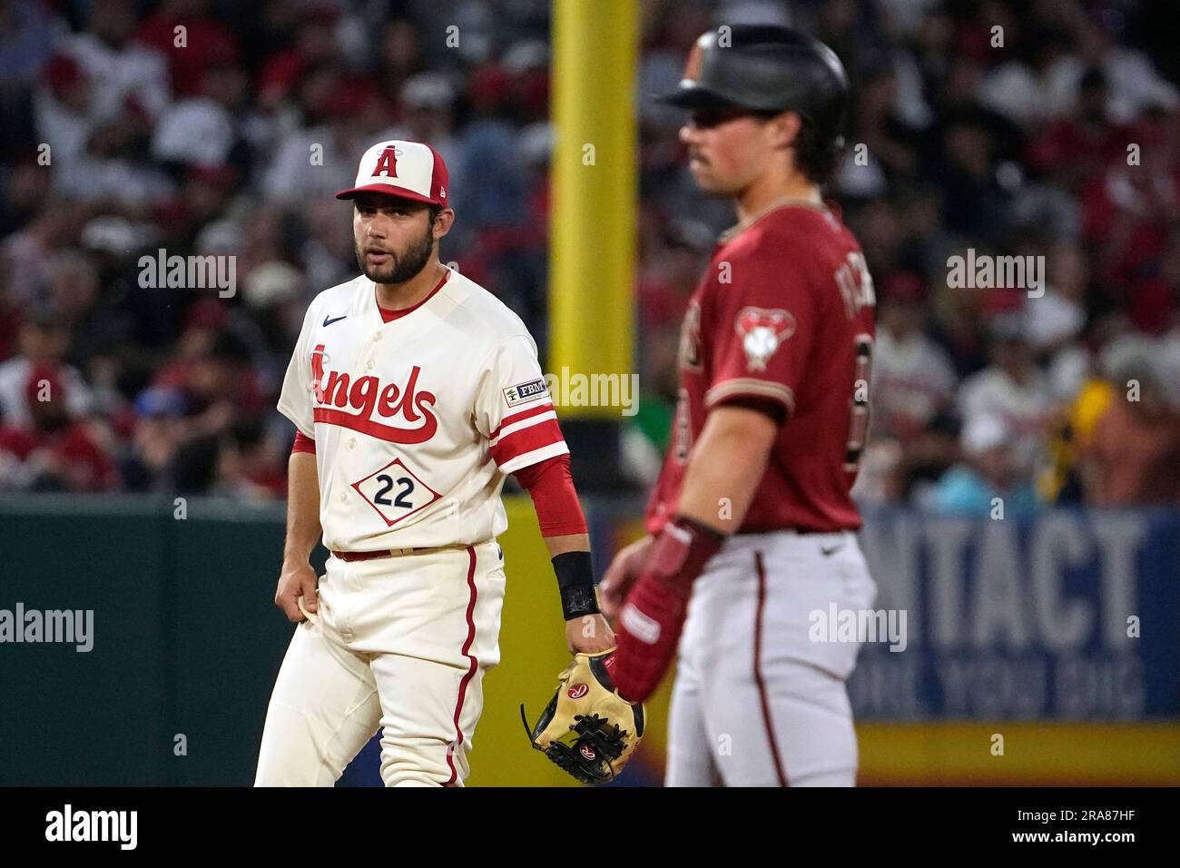 Los Angeles Angels shortstop David Fletcher, left, looks over at his