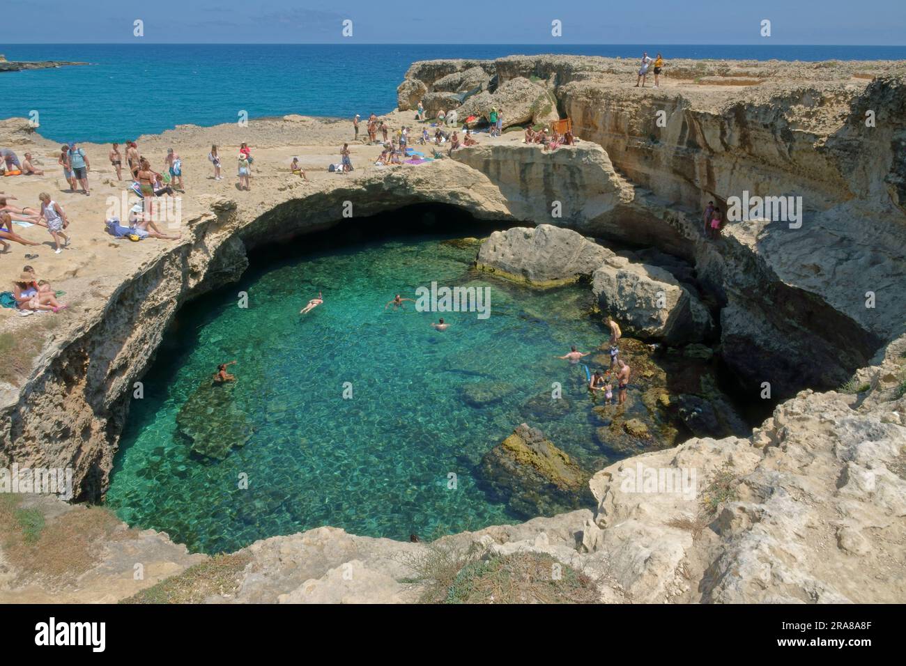 Lecce, Italy / June 8, 2023: The Grotta della Poesia (aka Cave of Poetry) natural seawater pool is shown during the day. Stock Photo