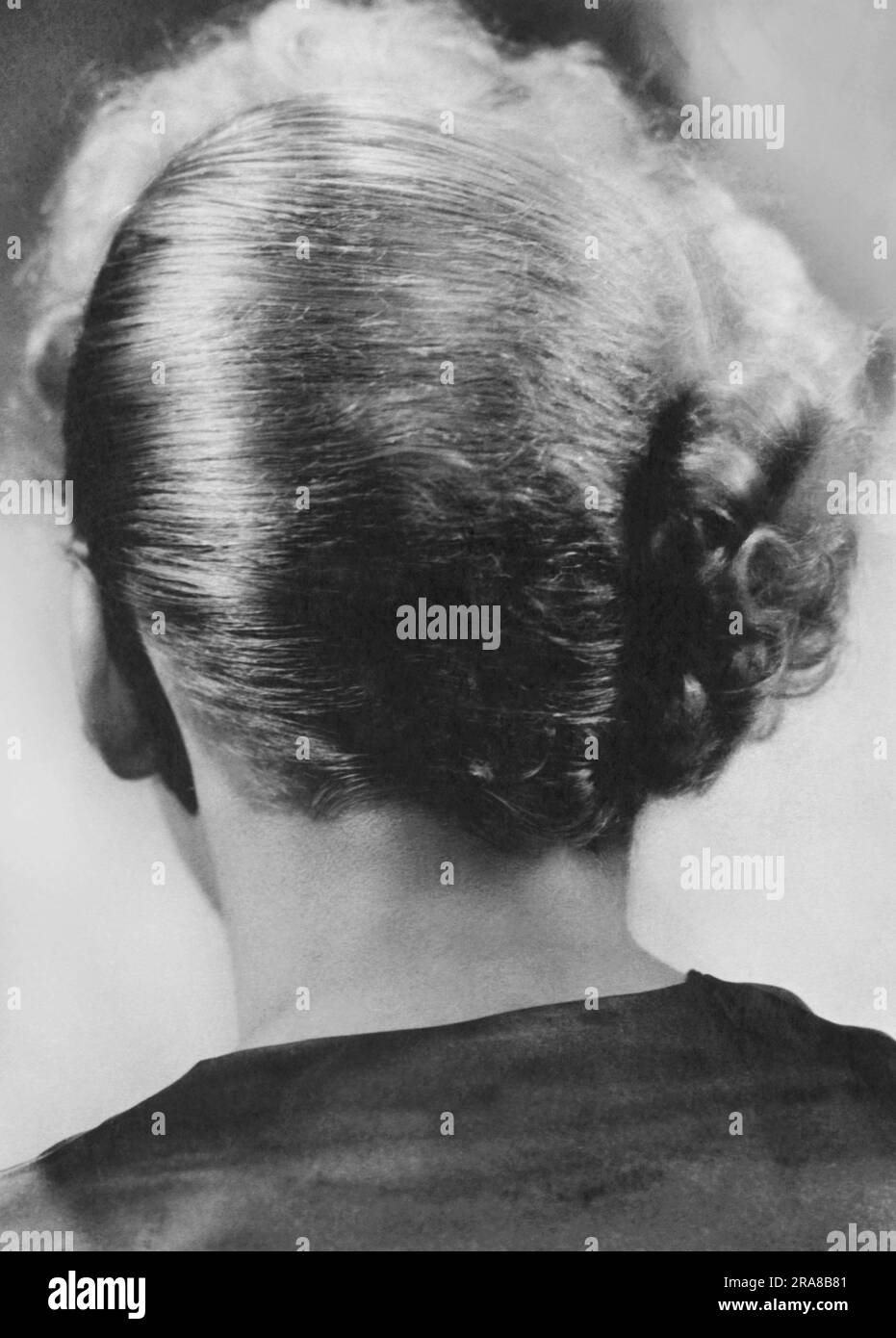 Hollywood, California:   March 22, 1934 A photo of the back of actress and film director Ida Lupino's head showing her unusual hair style. Stock Photo