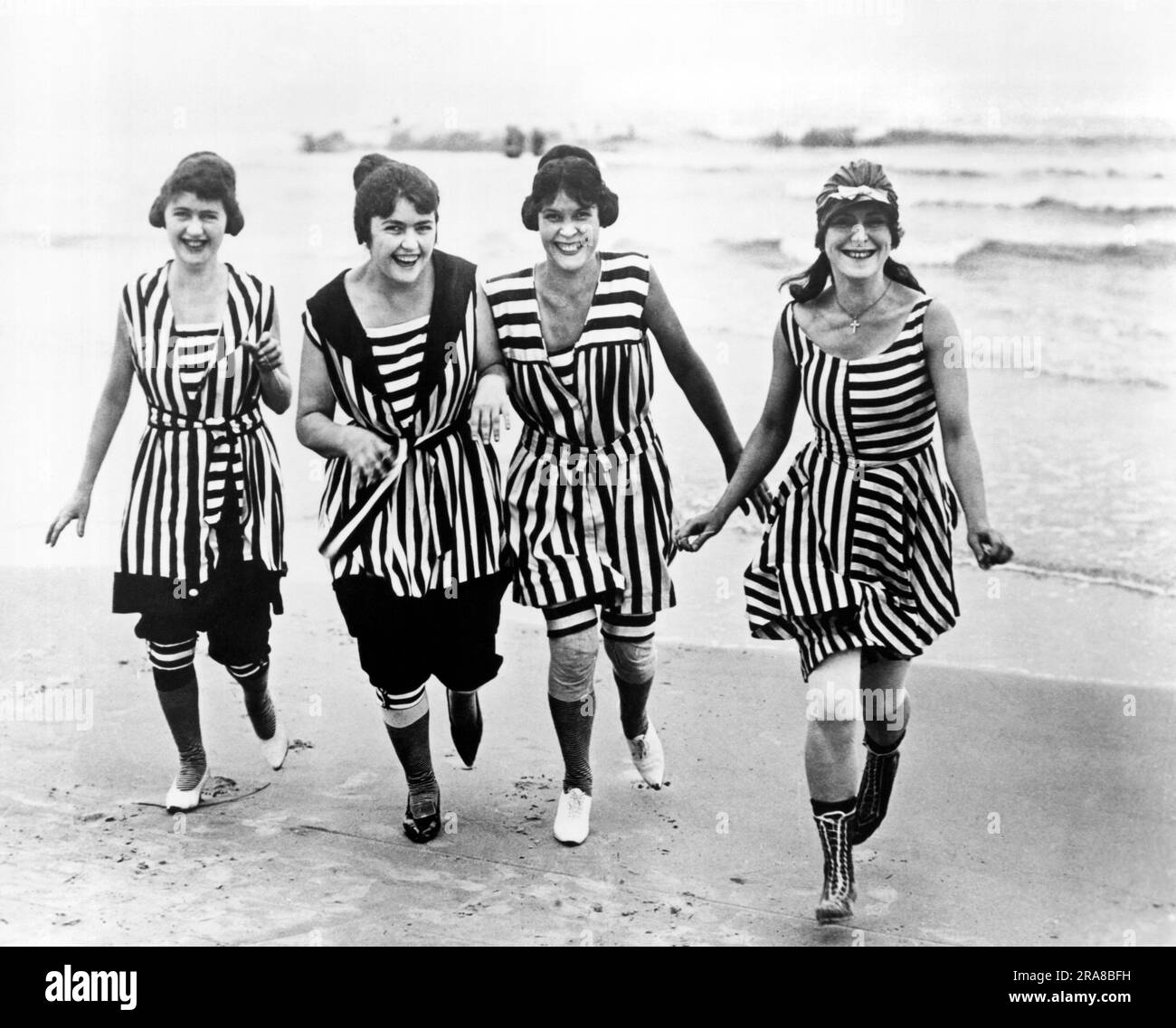 Los Angeles, California c. 1910. Four young women in matching beach