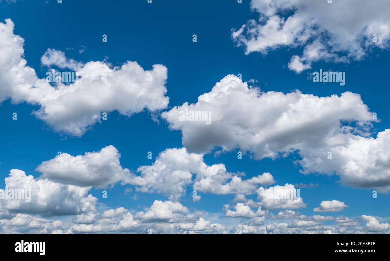 Bright sky with many cumulus clouds Stock Photo