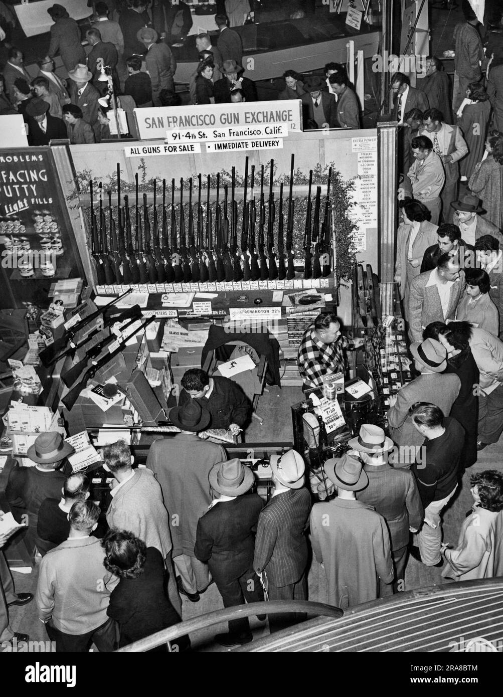 San Francisco, California c. 1952 Patrons at a San Francisco gun show