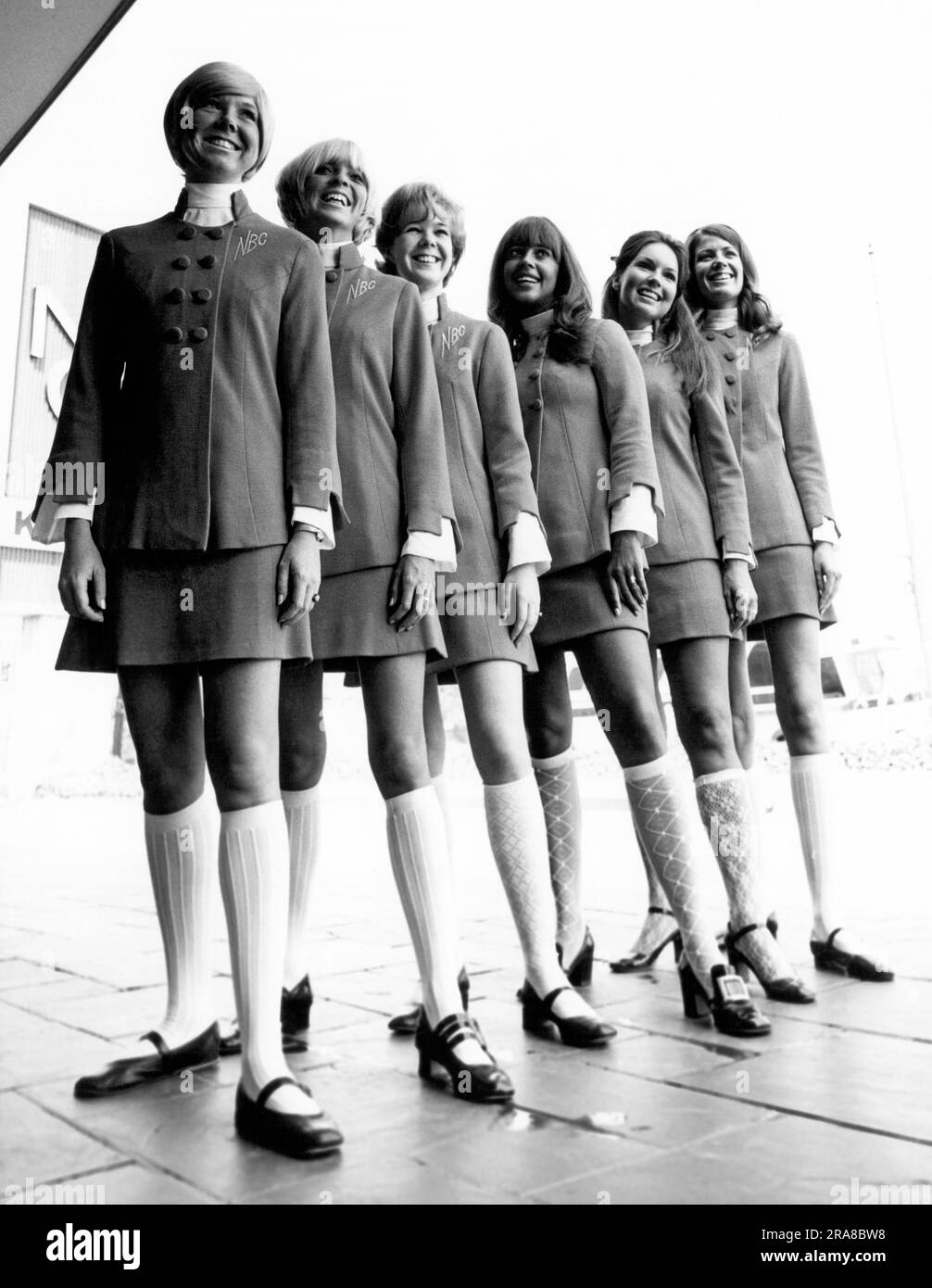 United States:   1970 Six NBC tour guides pose outside. Stock Photo