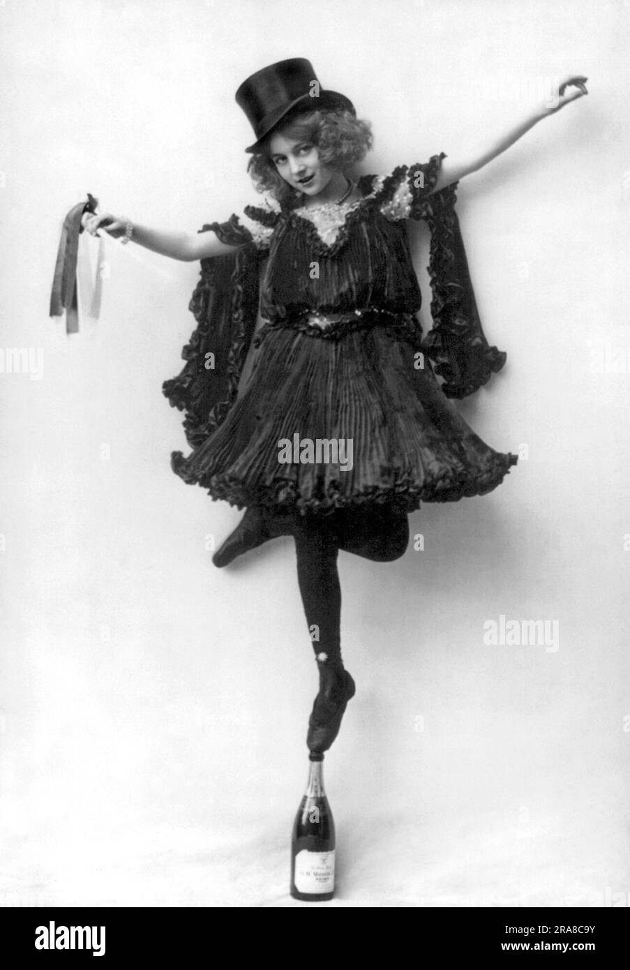 Providence, Rhode Island 1904. A woman in an ornate costume with black