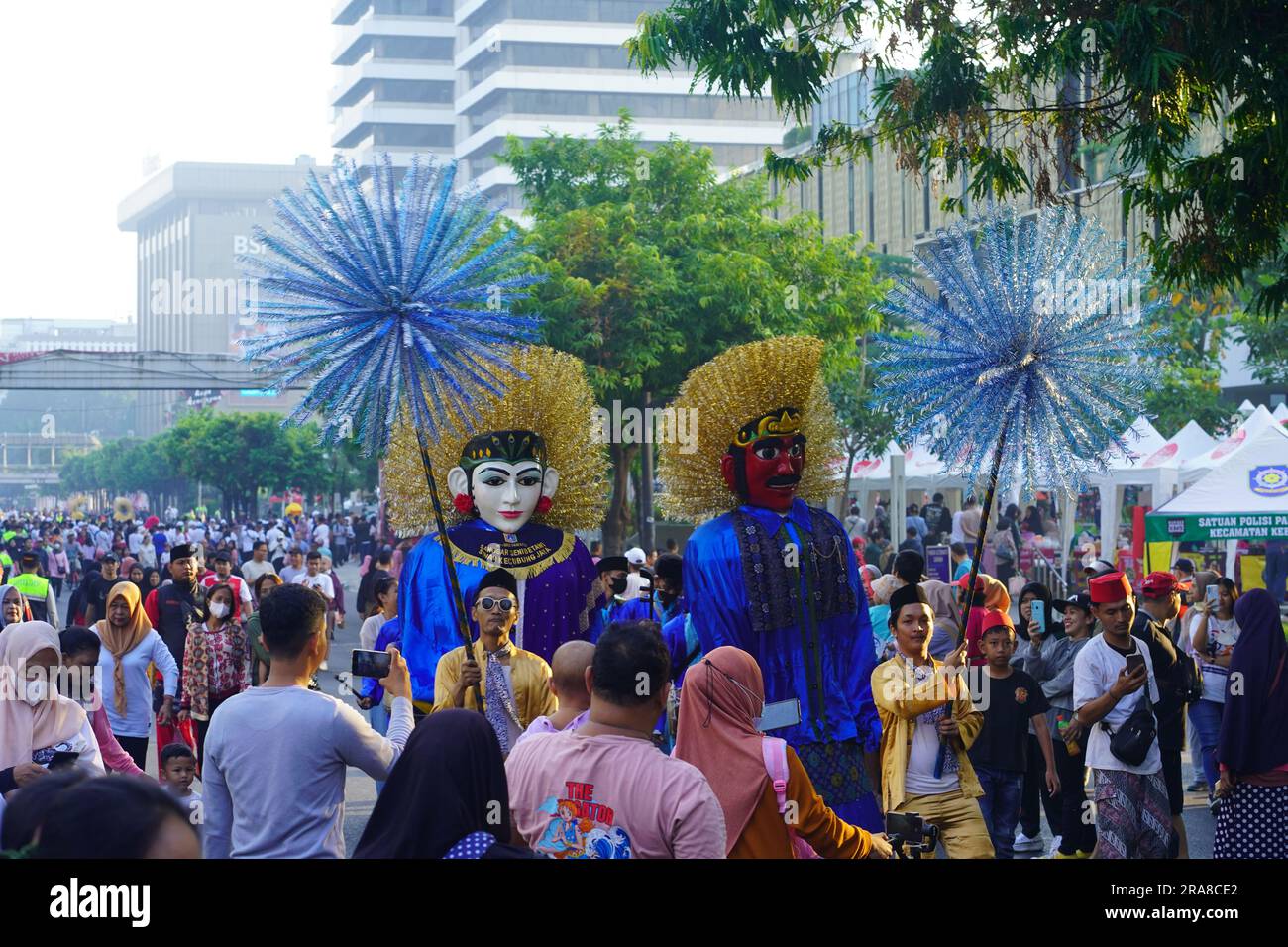 June 11, 2023 Ondel ondel or giant puppet of Betawi or Batavia in a carnival during Jakarta Car Free Day. Street Photography. Stock Photo