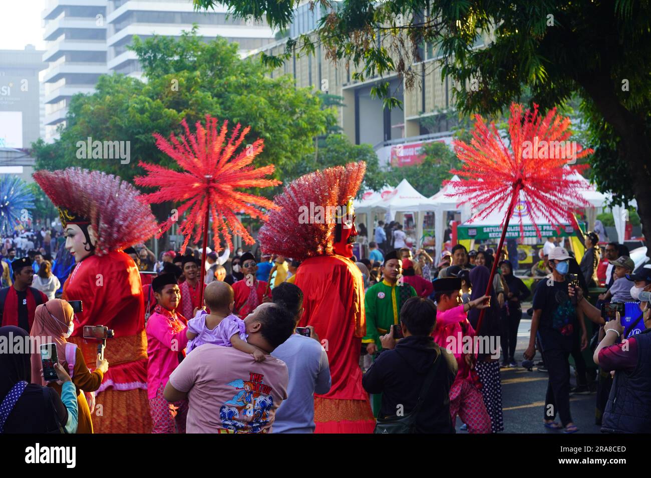 June 11, 2023 Ondel ondel or giant puppet of Betawi or Batavia in a carnival during Jakarta Car Free Day. Street Photography. Stock Photo