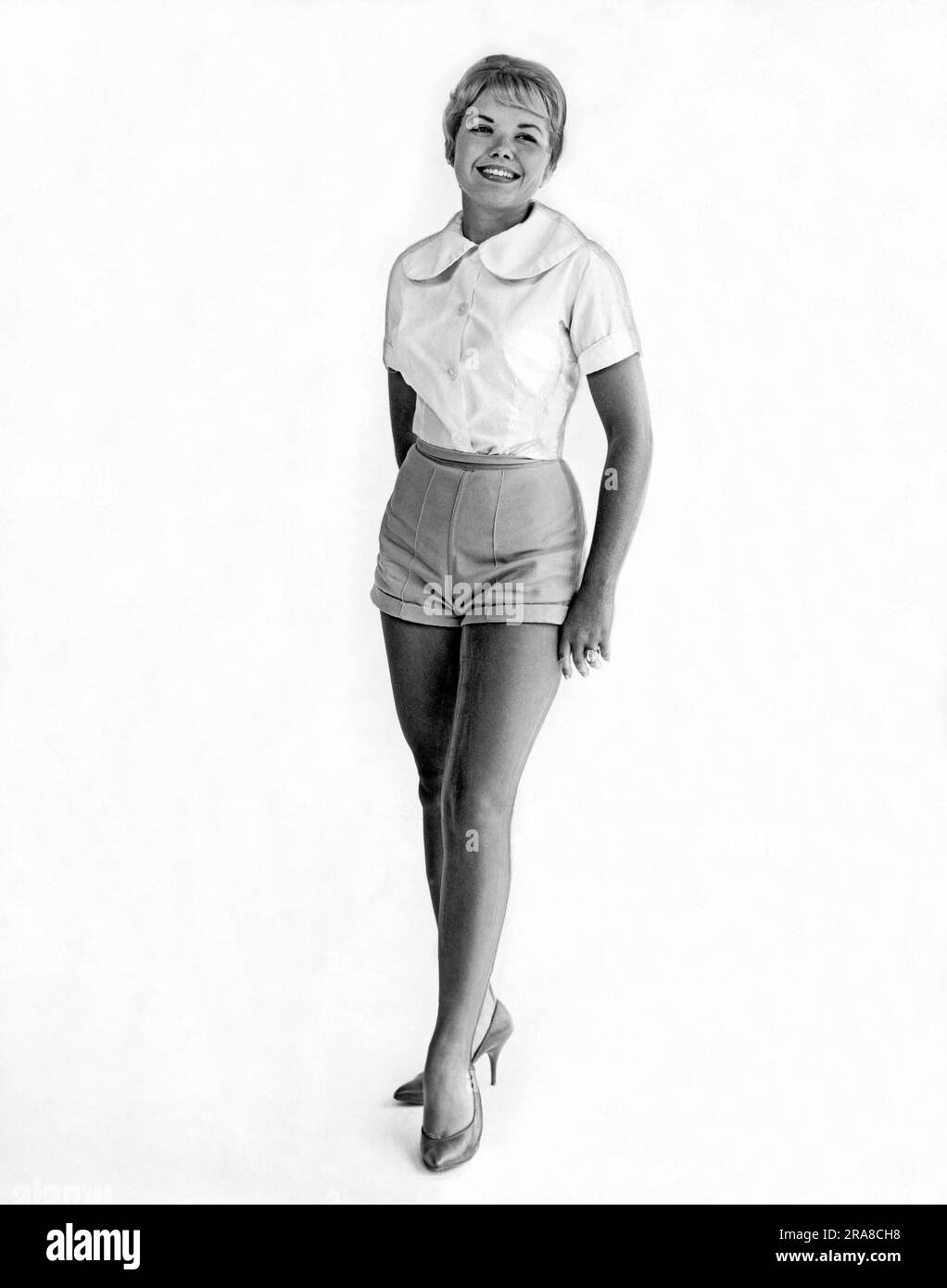 Woman wearing short shorts Black and White Stock Photos & Images - Alamy
