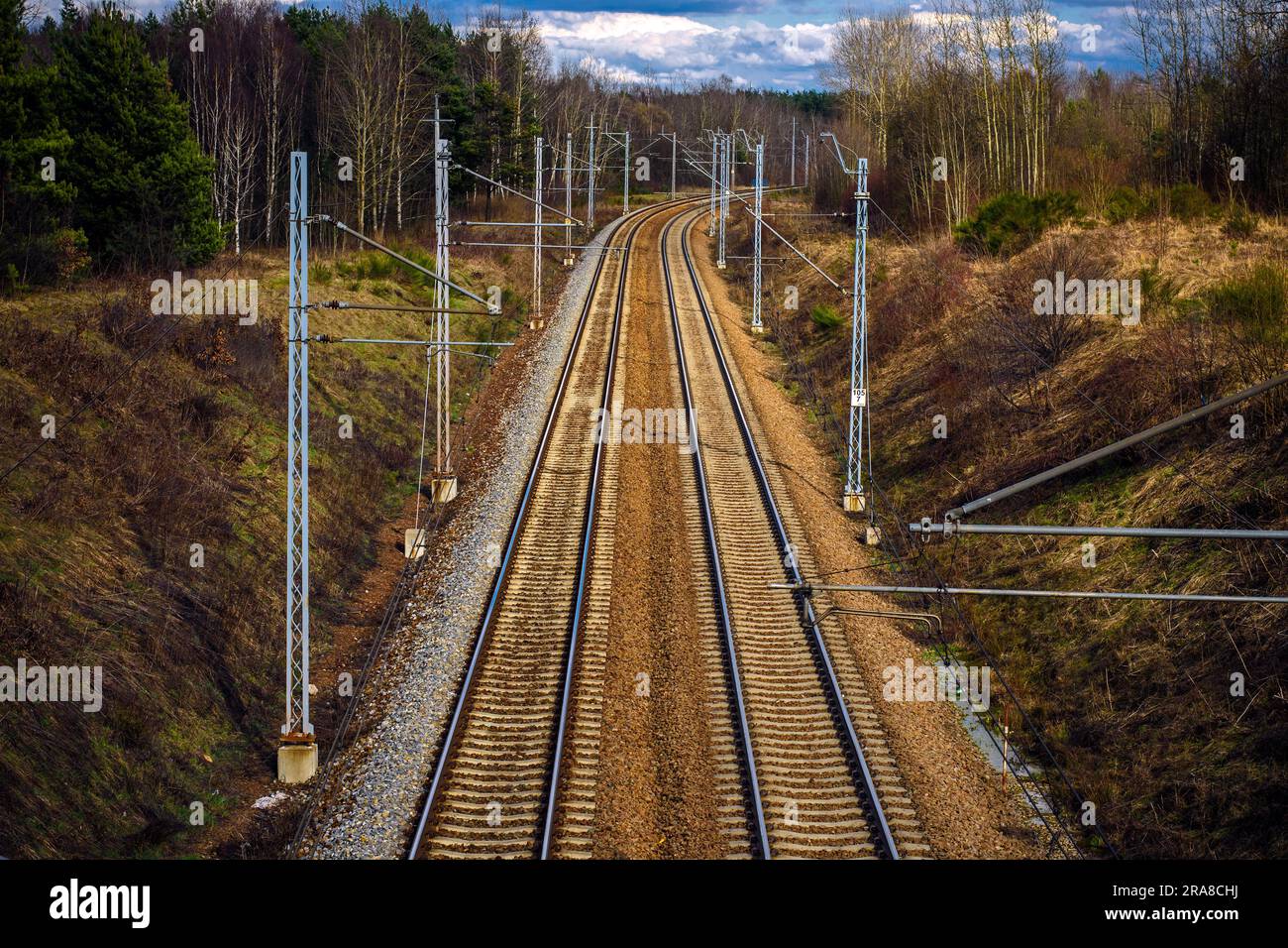 Railway tracks in the Eagle's Nests Landscape Park in early spring, Silesian Voivodeship, Poland. Stock Photo