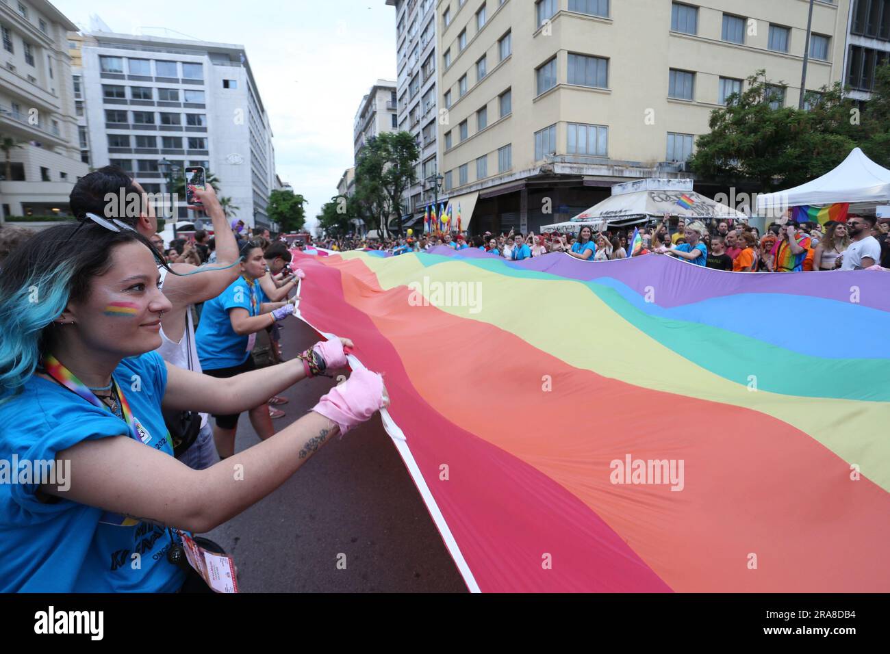 People sing and dance as they participate in the annual Gay Pride ...