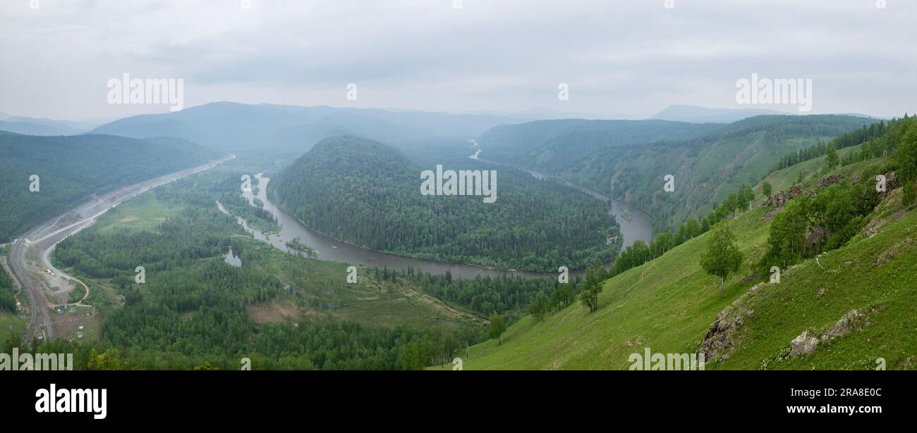Pick the best 26 keywords to describe the photo The winding Mana River