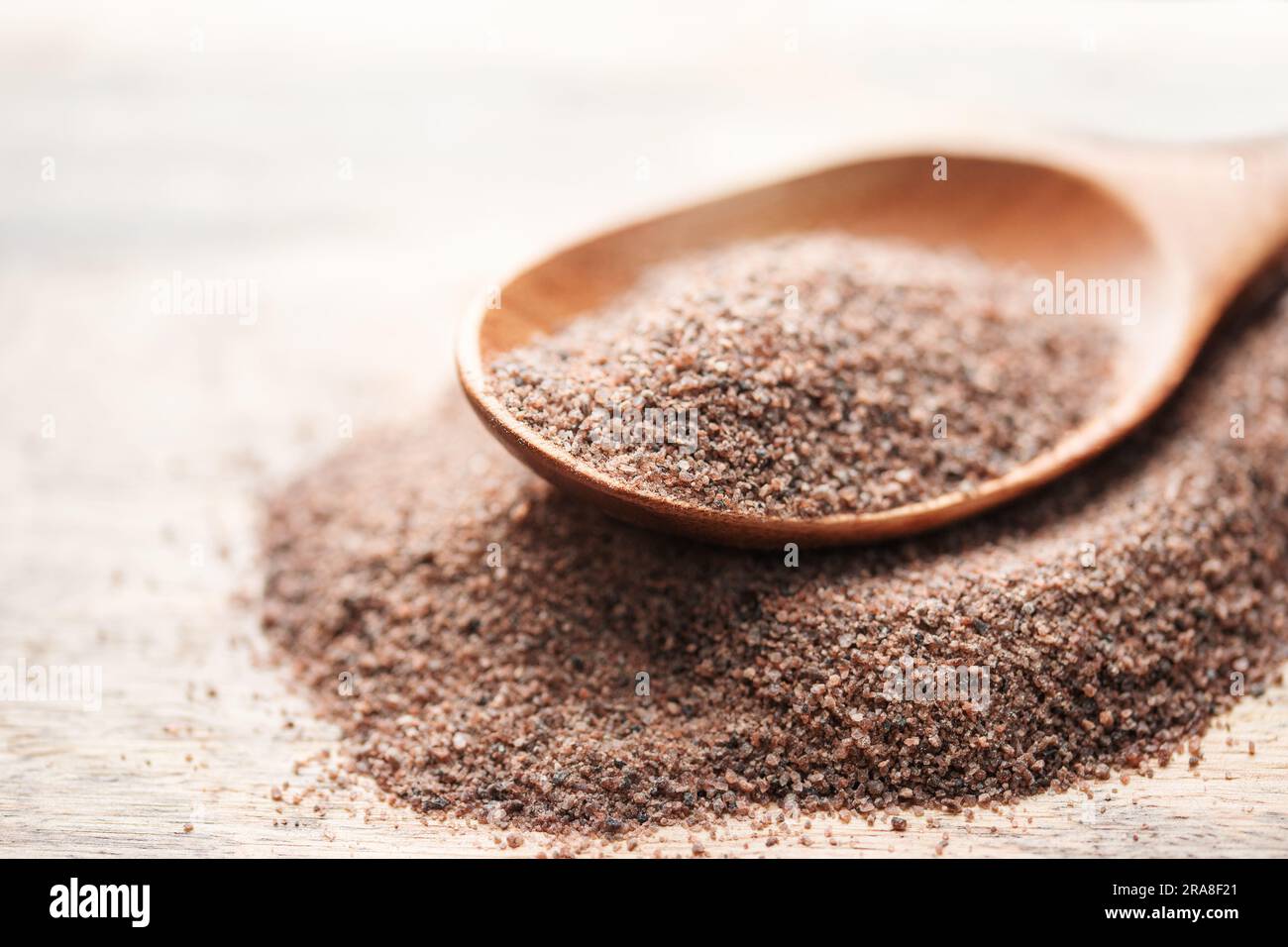 India black kala namak salt.  Healthy food concept. Speciality salt. Food background Stock Photo