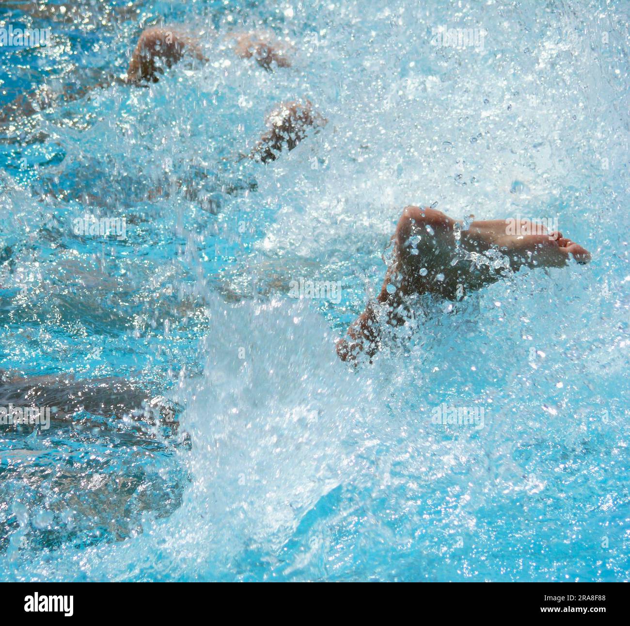 Splashing water, water gymnastics in the pool, foot gymnastics Stock Photo Alamy