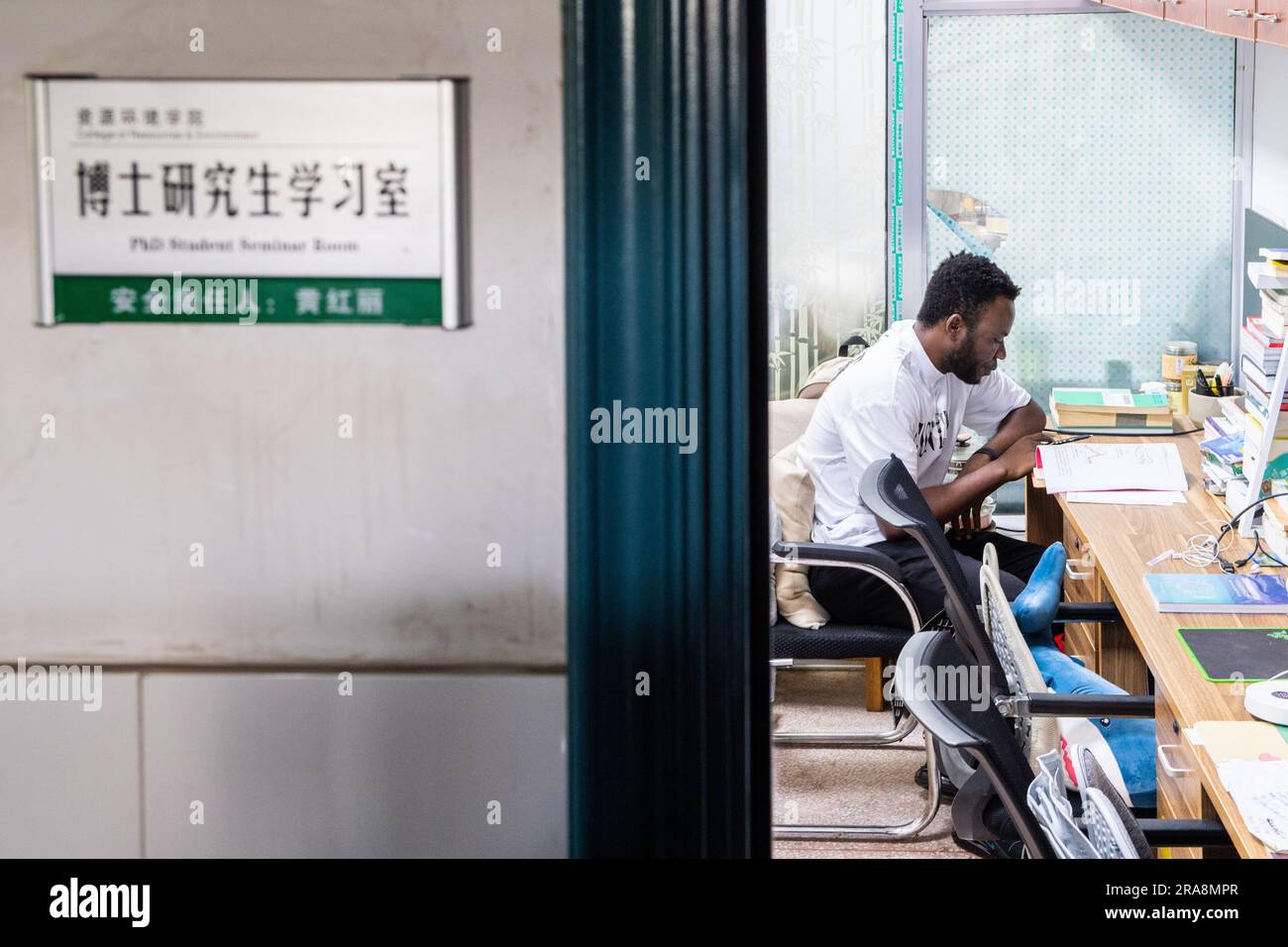 (230702) -- CHANGSHA, July 2, 2023 (Xinhua) -- Aguwa Dominic Ugochukwu studies at Hunan Agricultural University in Changsha, central China's Hunan Province, June 26, 2023. Aguwa Dominic Ugochukwu, 25, is a Nigerian doctoral student at Hunan Agricultural University. Inspired by his family's involvement in agriculture-related business and their importation of farming equipment and supplies from China, Dominic made up his mind to come to China to acquire modern agricultural knowledge.Currently, Dominic's research primarily focuses on the control and remediation of pollution in arable land. His in Stock Photo