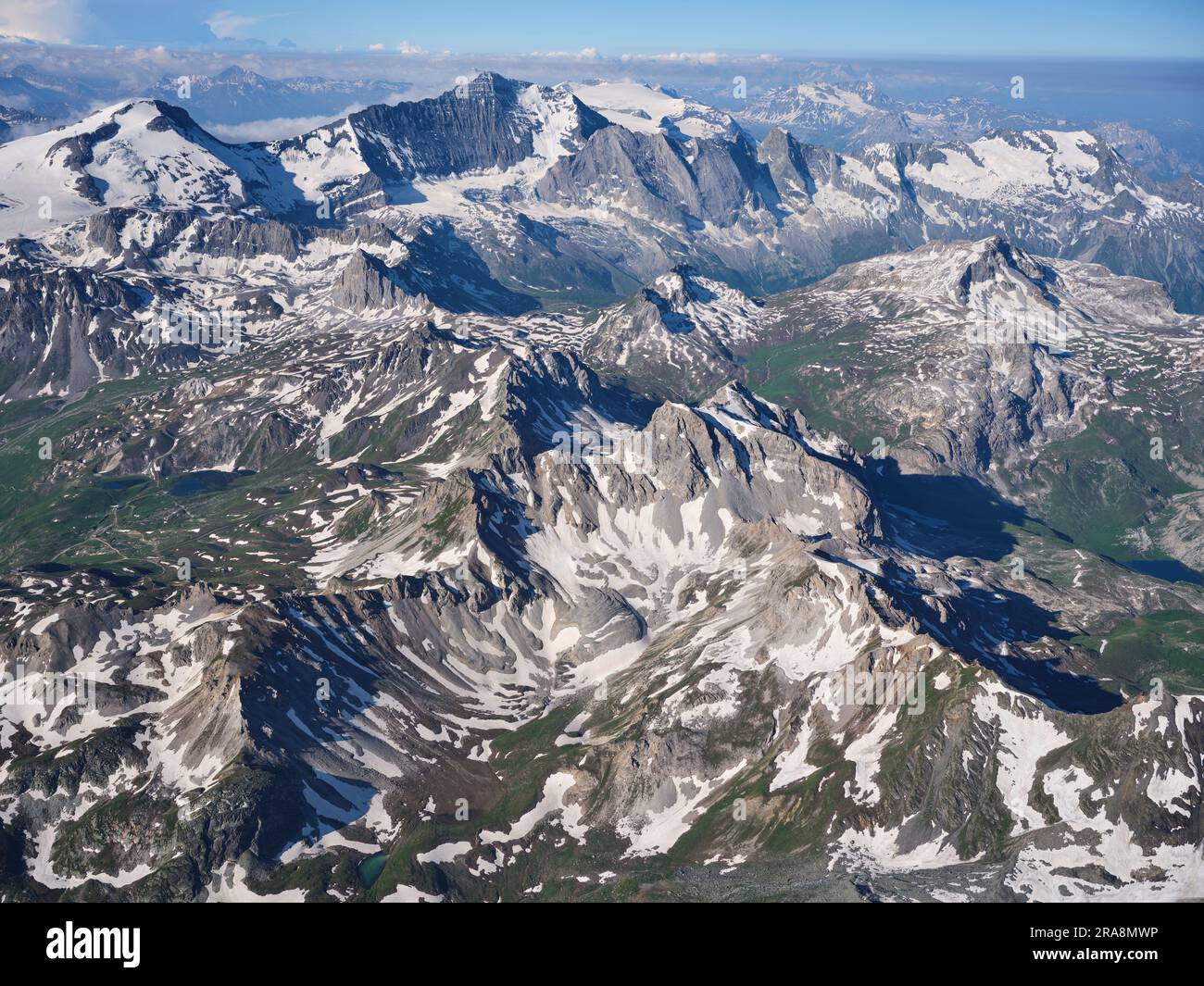 AERIAL VIEW. Mount Grande Motte (left, 3653m) and Mount Grande Casse (left of middle, 3855m). Vanoise Massif, Auvergne-Rhône-Alpes, France. Stock Photo
