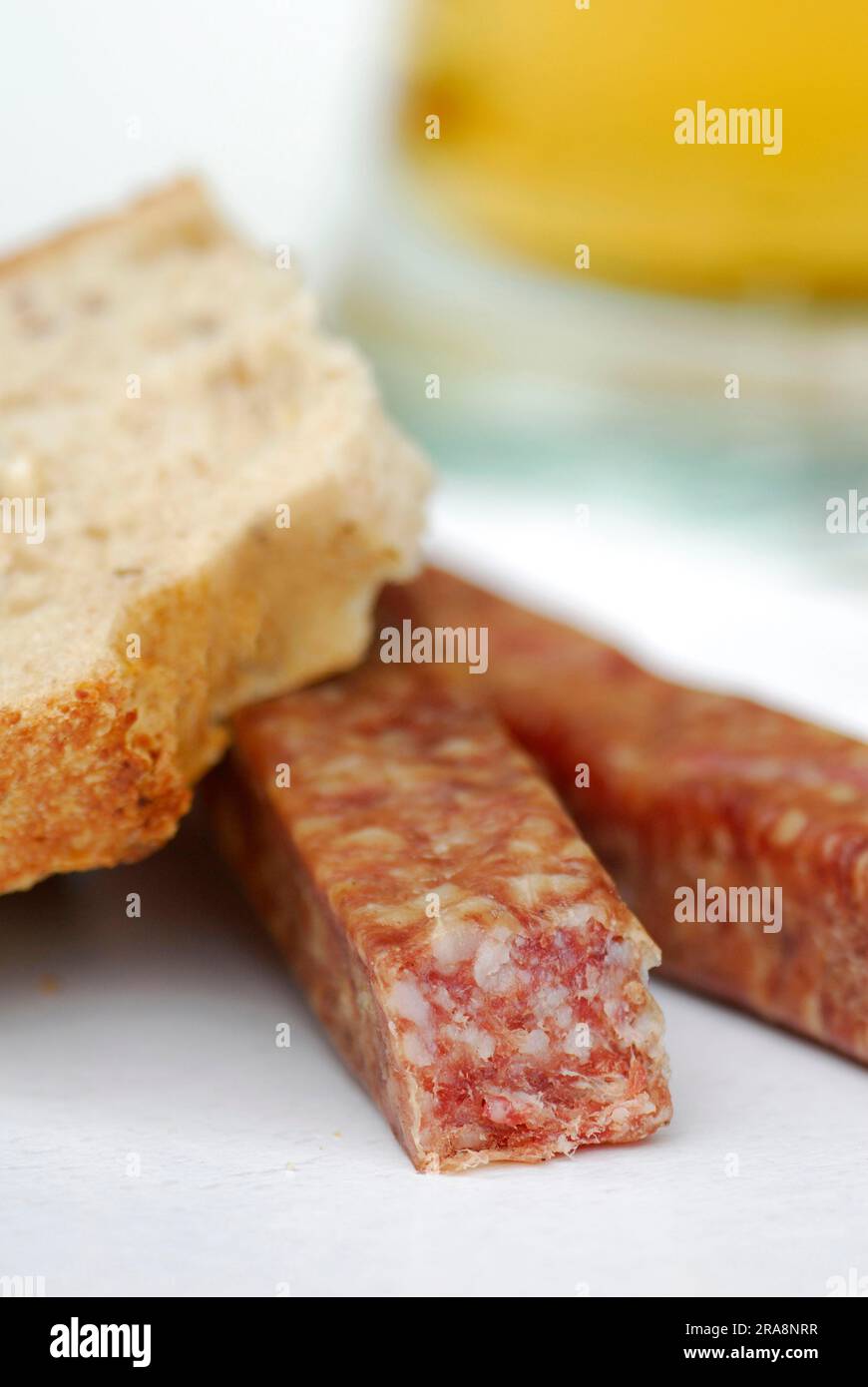 Mettwurstchen with bread, Landjaeger, hard sausage, sausage Stock Photo