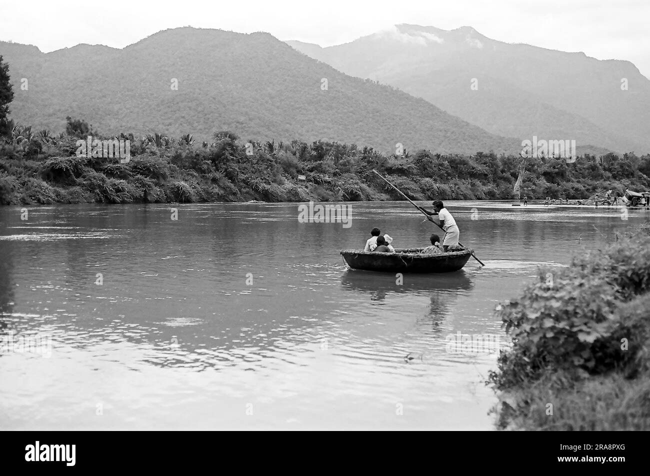 black and white photo, A coracle crossing River Bhavani near ...