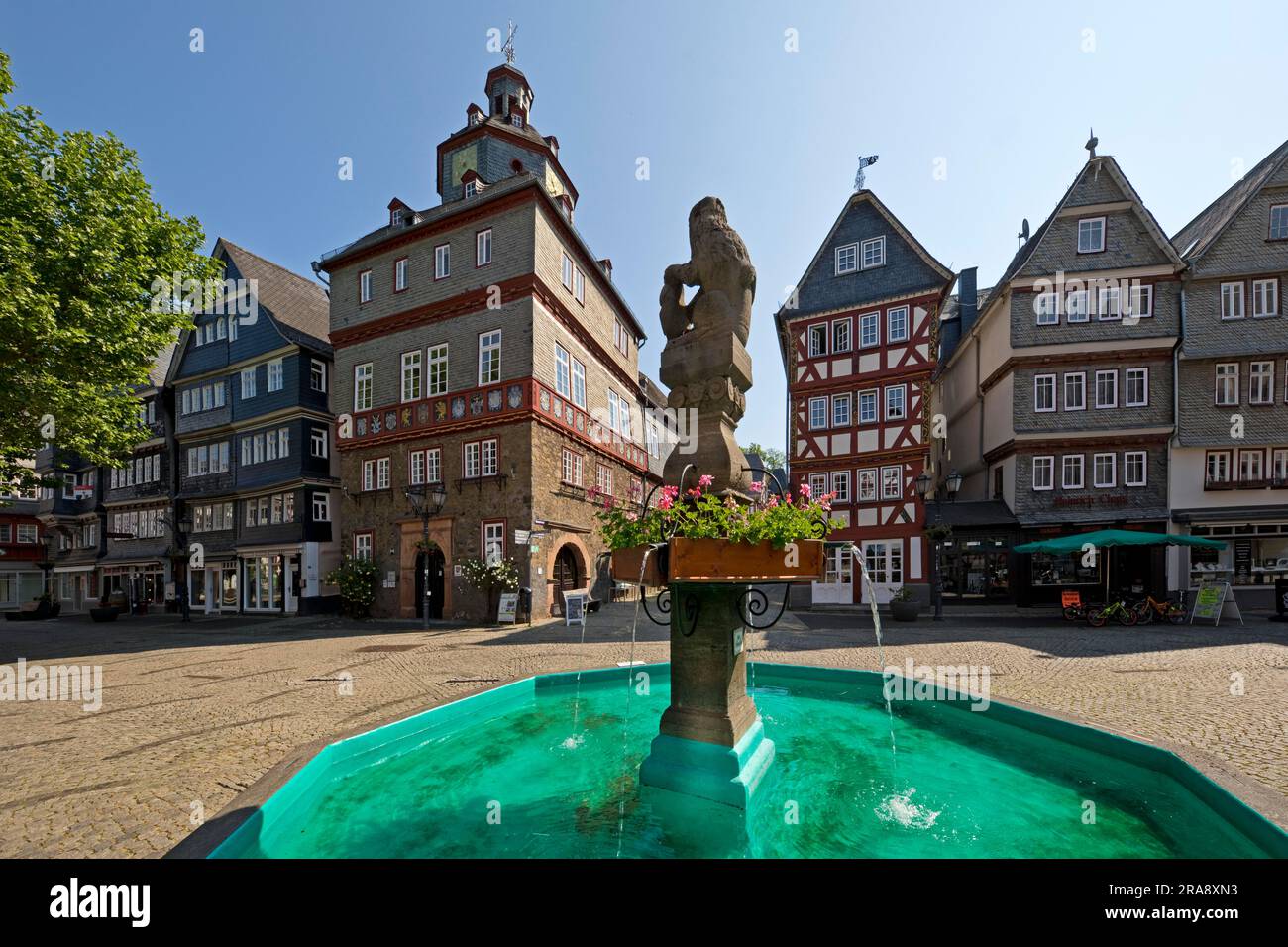 Market fountain with town hall and half-timbered houses at Buttermarkt, historic old town, Deutsche Fachwerkstrasse, Herborn, Hesse, Germany Stock Photo
